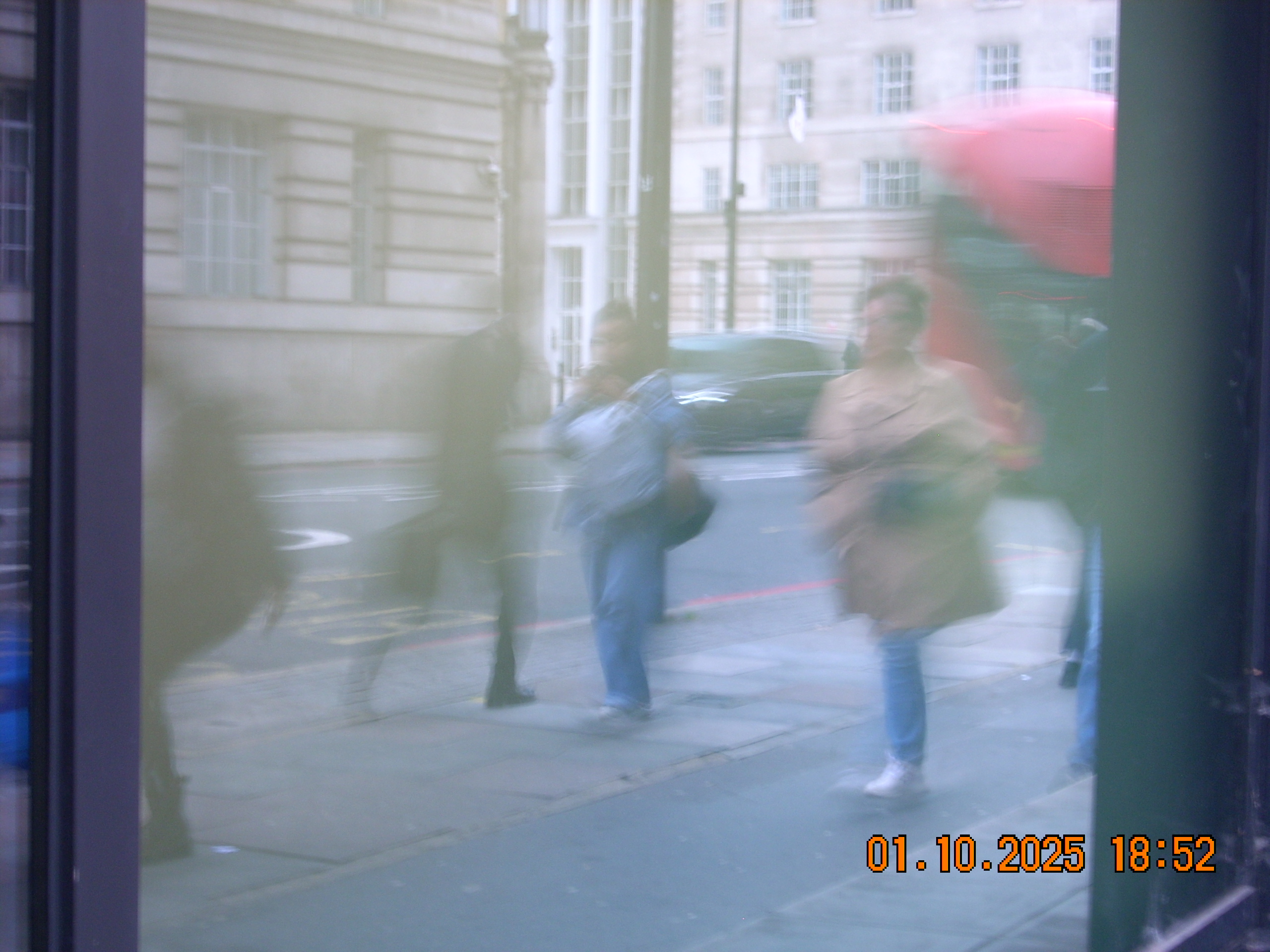 streetview reflected in a window
